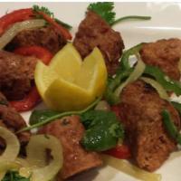Seekh Kabob · Kebabs made in iron rod  with  minced lamb and chicken.  Full of flavorful spices such as mi...