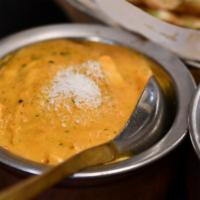 Korma · A special dish of tender chunks of Choice of meat marinated then cooked with onion, cream, c...