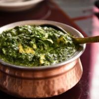 Saag · Boneless tender meat pieces cooked with chopped spinach and freshly ground spices, garlic an...
