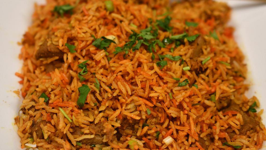 Biryani · Mix biryani of lamb, shrimp, chicken, and fresh vegetables seasoned with saffron and garnished with raisins and cashews. Served with raita and naan.