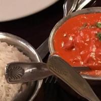 Delhi'S Butter Chicken · Boneless pieces of dark meat cooked in a fresh tomato sauce with a touch of light cream and ...
