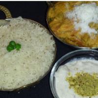 Vegetable Korma · A specaial dish of mix vegetables and paneer cooked with onion, cream, cashew, coconut, rais...