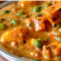 Mutter Paneer · Mutter Paneer is a dish of homemade cheese and green peas cooked in a savory cream sauce. (GF)