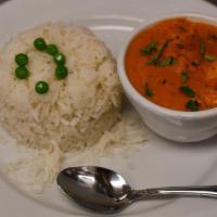 Chicken Tikka Masala · Fire-roasted chicken cooked with sliced onion and bell peppers, with tomato sauce and a touc...