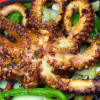 A La Plancha / Whole Grilled Octopus · / .