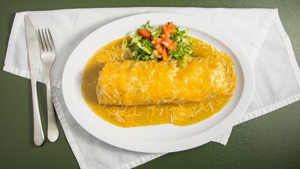 Smothered Burrito · Served with beans, cheese, pico, sour cream, and guacamole.