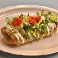 Chimichanga · Served with beans, cheese, sour cream and guacamole, lettuce, dry cheese and tomatoes on the...