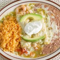 Enchiladas Del Mar · Shrimp or crab enchiladas topped with green sauce. Monterey jack cheese, avocado slices, and...