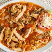 Arroz Con Pollo · Boneless Breast chicken sautées in a special sauce with mushrooms, and vegetables, served ov...