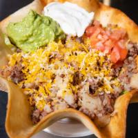 Taco Salad · CHOICE OF MEAT IN DEEP FRIED TORTILLA SHELL, LETTUCE, TOMATO, CHEESE, SOUR CREAM, GUACAMOLE ...