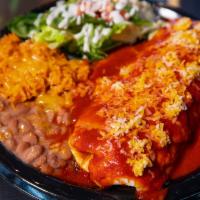 Burrito Special · ONE MEAT & BEAN BURRITO SMOOTHERED WITH RED OR GREEN, RICE, BEANS, SALAD.