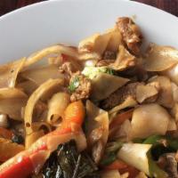 Drunken Noodles · Vegetarian. Spicy stir-fried fat noodles with bell peppers, tomatoes, mushroom, onions brocc...