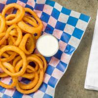 Onion Rings · A hefty portion of delicious onion rings fried golden brown and served with ranch.