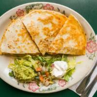 Quesadilla Marina (Seafood) · Two large flour tortillas filled with baby prawns, crab, tomato, onion, mushroom, jack and c...