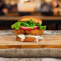 Classic Fried Chicken Sandwich · Crispy fried chicken with mayo on a warm griddled bun.