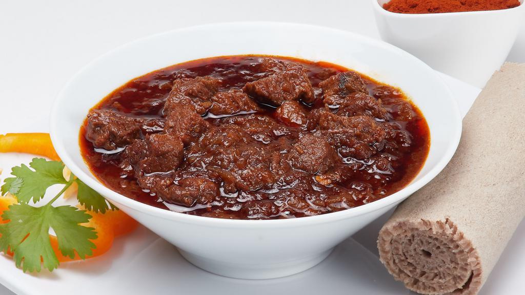 Key Sega Wat (Spicy Beef Stew) · Tender beef cubes simmered in spicy berbere (chili powder) sauce and onion, flavored with various spices.