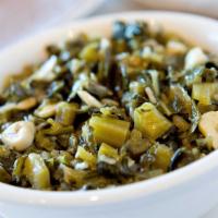 Gomen (Collard Greens) · Chopped collard greens cooked with fresh garlic, ginger and onion.