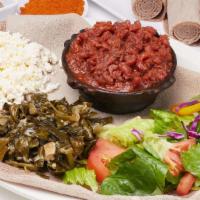 Kitfo · (Ground beef resembling steak tartar) lean tender beef finely chopped and mixed with mitmita...