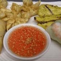 A11 Combination · A Family favorite platter of egg rolls (2), salad rolls, (1) and crab ragoon (3) Chicken Sa-...