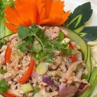 24 Larb · Classic Thai dish made with sauteed ground meat avored with a spicy and tangy mix of mint l...