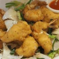 64 Salt And Pepper Shrimp · Deep fried shrimp tossed with onion and black pepper.
