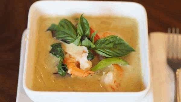 56 Green Curry · Your choice cooked in Thai green curry with sweet basil leaves, eggplants, bamboo shoots and bell pepper.