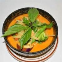 55 Red Curry · Your choice cooked in Thai red curry with sweet basil leaves, eggplants, bamboo shoots and b...