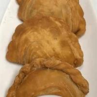 T1 Curry Puff · Crispy puff dough filled with chicken, potatoes, onions and light of curry powder served wit...