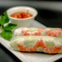 Fresh Spring Rolls (2) · Fresh basil, cucumber, lettuce, rice vermicelli and choice of protein wrapped in thin rice p...