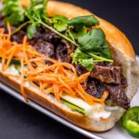 Beef Banh Mi · French Bread with grilled lemongrass short ribs.
Add EXTRA FRIED EGG for an additional charg...