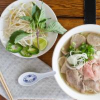Pho 36 Special(Combo Beef) · The Noodle soup is topped with rare eye-of-round steak, beef flank, crunchy beef fat, beef b...