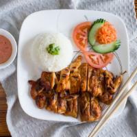Grilled Chicken Rice Plate · Grilled marinated Chicken served with steamed rice.