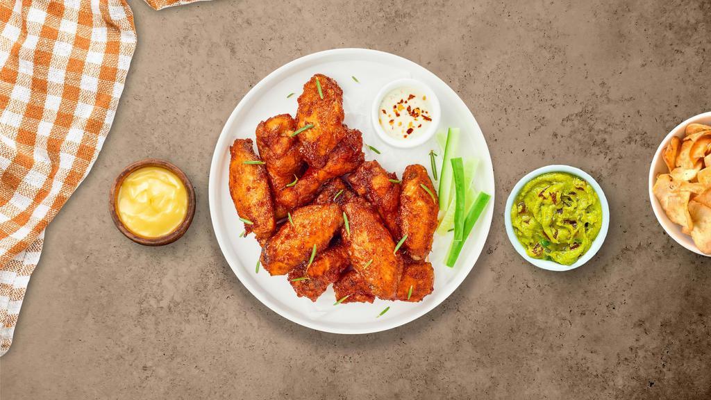 Mild Mild Wings · Fresh chicken wings fried until golden brown, and tossed in mild buffalo sauce. Served with a side of ranch or bleu cheese.