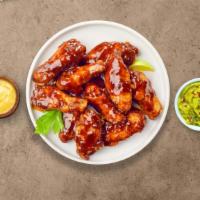 You'Re My Bbq Wings · Fresh chicken wings fried until golden brown, and tossed in barbecue sauce. Served with a si...