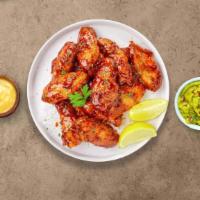 Honey Be My Bbq Wings · Fresh chicken wings fried until golden brown, and tossed in honey barbecue sauce. Served wit...