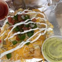 Rolled Tacos · 4 Rolled Shredded Beef  or  Chicken Tacos, With Cheese, Sour Cream, Lettuce, Pico De Gallo,
