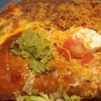 Chimichanga Plate · With Rice And Charro Beans,  Choice of Meat: Carne Asada, Shredded Beef, Shredded Chicken, R...