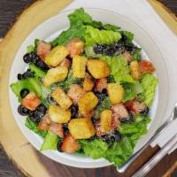 Italian Garden · Romaine, tomatoes, black olives, croutons, with your choice of dressing.