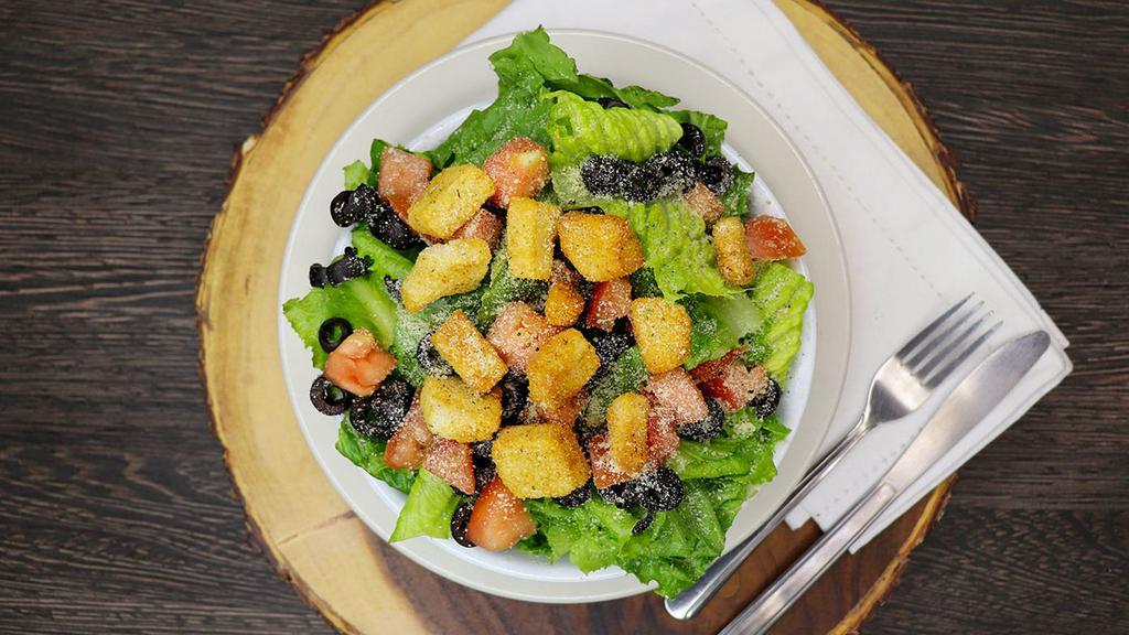 Italian Garden · Romaine, tomatoes, black olives, croutons, with your choice of dressing.