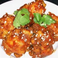 Gobi Manchurian · Vegan. Cauliflower florets sautéed in an Indo-Chinese sauce.