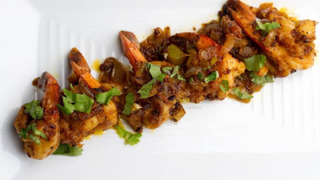 Lasooni Shrimp · Gluten Free.
Shrimp Sauteed In A Fresh Garlic, Onion, And Tomato glaze.