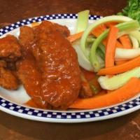 Boneless Buffalo Crispers · Served with carrots, celery, and blue cheese dressing.