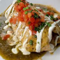 Chicken Verde Burrito · Shredded tinga chicken, green rice, bacon pinto beans & a cheddar jack cheese blend rolled i...