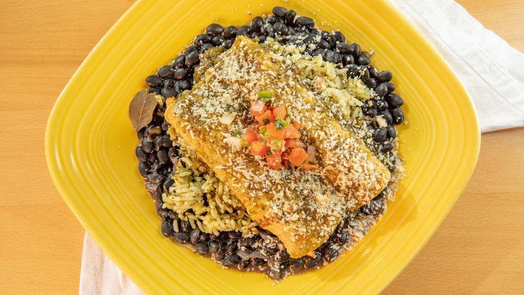 Enchiladas With Choice Of Protein · Corn tortillas filled with choice of protein, cheddar and jack cheese. Served with black beans, red rice or coconut rice and salsa verde.