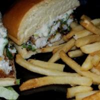 Classic Burger · Two plump and juicy 1/4 lb. patties seasoned and grilled to order. Served with lettuce, toma...