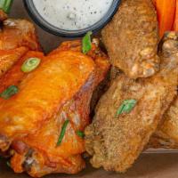 Wings · brined boulder natural chicken, choice of buffalo, sriacha-lime or dry green chile rub, cele...