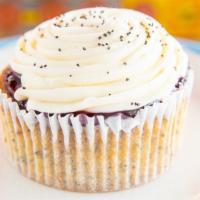 Marionberry Poppyseed Jumbo Cupcake · With Oregon marionberry jam topped with cream cheese icing.