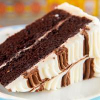 Chantilly Cake Slice · Chocolate cake with cream cheese icing.