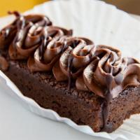 Triple Chocolate Lust Xxx Brownie · Chocolate brownie, chocolate icing, and chocolate drizzle.
