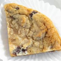 Chocolate Chip Cookie Wedge Bite · With a hint of almond drizzled with chocolate ganache.